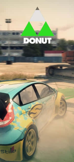 拉力賽車在泥地賽道上飄移，上方有DONUT標誌 — Galaxy A55 壁紙