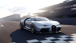 銀色Bugatti Chiron在賽車場上越過格子旗終點線。 — 布加迪 GIF 壁紙