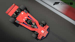 紅色復古賽車在 Forza Motorsport 7 遊戲中在賽道上飛馳。 — 電玩遊戲 GIF 壁紙