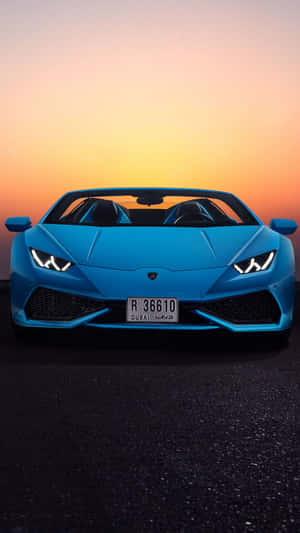 藍色藍寶堅尼 Huracán Spyder 在日落時分，帶有杜拜車牌。 — 好看汽車 壁紙