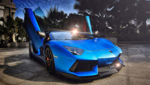 藍色藍寶堅尼Aventador開門停泊在戶外日落時分。 — 汽車 壁紙