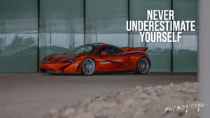 橙色McLaren P1超級跑車搭配勵志名言「永遠不要低估自己」 — 跑車 壁紙