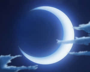 在深藍色夜空中發光的彎月，伴隨著柔軟的雲朵。 — 月亮與星星 壁紙