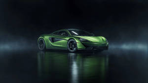 黑暗攝影棚中帶有煙霧和地板反射的螢光綠McLaren跑車。 — 麥拉倫 壁紙