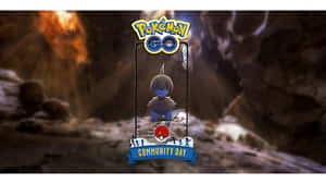 Pokémon GO 社群日活動，洞穴中的手機螢幕上顯示一隻藍色寶可夢。 — 寶可夢 壁紙
