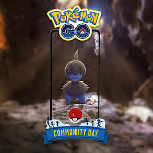 Pokémon GO 社群日活動在洞穴中的智慧型手機螢幕上顯示 Grimmsnarl。 — 三島一八 壁紙