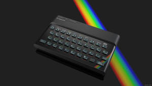 深色背景上帶有彩虹光束的黑色Sinclair ZX Spectrum電腦 — 波浪 壁紙
