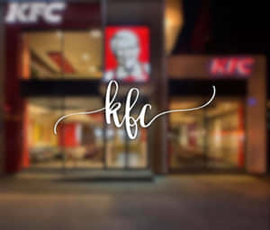 夜間的KFC餐廳，帶有發光招牌和草書標誌疊加。 — 肯德基 壁紙