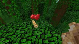 一隻像素化貓咪在Minecraft森林中帶著漂浮的紅色愛心。 — 我的世界 壁紙