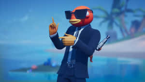 橙色企鵝穿西裝戴太陽眼鏡在熱帶海灘上手握手槍。 — 魚棒 Fortnite 壁紙