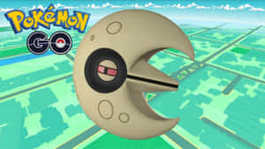 一隻月亮形狀的寶可夢漂浮在帶有Pokémon GO標誌的綠色城市地圖上方。 — 電玩遊戲 GIF 壁紙
