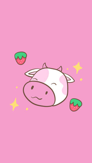 一隻微笑的卡通牛，在粉色背景上有草莓和閃光。 — 草莓乳牛 壁紙