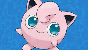 粉紅色Jigglypuff，大藍眼睛，在藍色背景上微笑 — 可愛寶可夢 壁紙