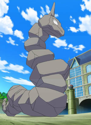 巨大的岩石蛇寶可夢站在藍天下的建築物前。 — Pokémon 手機 壁紙
