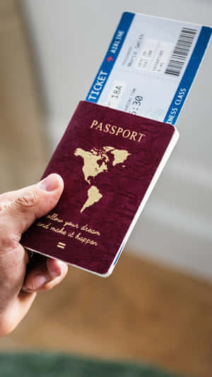 手持護照和機票，準備好旅行。 — 9:16 壁紙