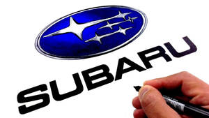 手繪 Subaru 標誌和文字，使用黑色麥克筆在白紙上。