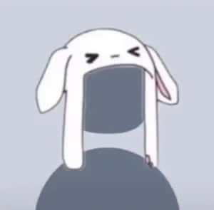 一隻表情不悅的卡通兔，長耳朵，坐在灰色球體上。 — TikTok 動圖 壁紙