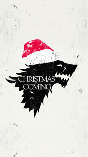 戴聖誕帽的黑狼，附有文字 Christmas is Coming — 可愛聖誕 iPhone 壁紙
