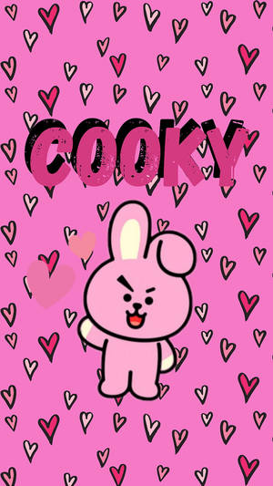 粉紅色卡通兔子憤怒面容，被心形和cooky字樣包圍。 — 廚奇 BT21 壁紙