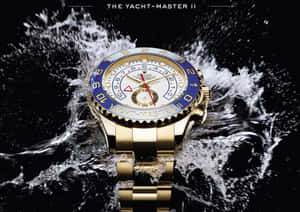 金色勞力士Yacht-Master II手錶從水花中浮現。 — 勞力士標誌 壁紙