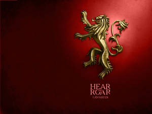金色獅子標誌，帶有 hear me roar lannister 文字，紅色背景 — 蘭尼斯特家族 壁紙