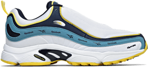 白色、藍色和黃色 Reebok DMX 運動鞋的特寫，帶有醒目品牌標誌。