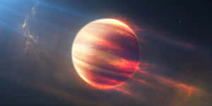 一顆發光的紅色和橙色氣體巨星行星，被宇宙星雲和星光包圍。 — 宇宙美學 壁紙