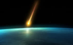 一顆明亮的流星在星空背景下墜向一顆藍色行星。 — 月夜星空 壁紙