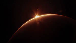 太陽在太空中一個微紅的外星行星上升起，星星可見。 — 火星人布魯諾 壁紙