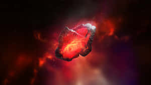 一顆熾熱發光的小行星漂浮在色彩繽紛的宇宙星雲中。 — 昏暗 壁紙