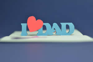 藍色紙字母拼出 I DAD，I 上方有一顆紅色愛心。 — 爸爸 壁紙