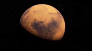 火星在繁星點點的太空虛空中發出橙色光芒。 — 火星人布魯諾 壁紙
