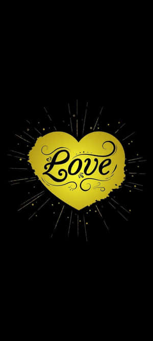 一顆發光的金色心臟，上面有黑色草書字體「Love」，背景為黑色。 — 20:9 壁紙