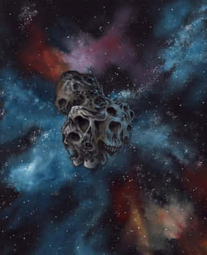 骷髏形狀的小行星漂浮在色彩繽紛的星空星雲中 — 星際效應 壁紙