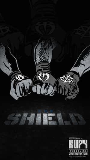 三位摔角手拳頭緊扣，展示手套上的The Shield標誌。 — 摔角 壁紙