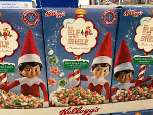 Kellogg's Elf on the Shelf穀物盒，精靈拿著星形穀物和棉花糖。 — 前衛動漫 壁紙