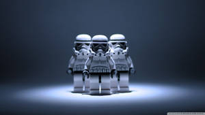 三個LEGO風暴兵在深色背景上被聚光燈照亮。 — 樂高 壁紙