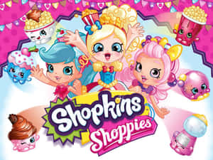 三個Shopkins Shoppies角色，帶有糖果主題配件和笑臉。 — 縮圖 壁紙