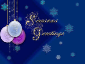 節日裝飾品和雪花，帶有金色的「Seasons Greetings」文字。 — 慶祝 壁紙