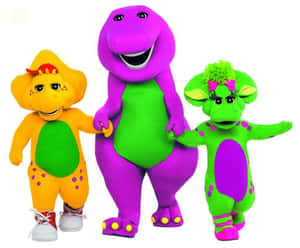 紫色恐龍 Barney 和兩個朋友穿著彩色服裝手牽手。 — Pbs Kids 壁紙
