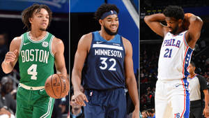 三名NBA籃球運動員在比賽中穿著球隊球衣。 — 巴爾的摩金鶯 壁紙