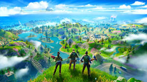 三名玩家從山頂俯瞰色彩繽紛的Fortnite地圖。 — 電玩遊戲 GIF 壁紙