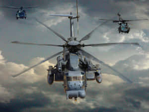 三架軍用直升機穿過暴風雲層編隊飛行。 — 直升機 壁紙