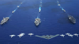 三艘航空母艦及戰鬥機在海洋上空編隊飛行。