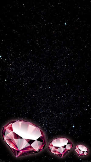 三顆粉紅色鑽石在繁星閃爍的夜空中漂浮 — 鑽石 壁紙