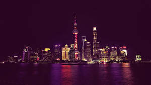 上海夜景天際線，發光的建築物倒映在河中。 — 唐人街 壁紙