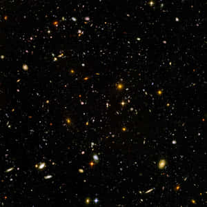 深邃宇宙中密集的星系和恆星場。 — 宇宙 壁紙