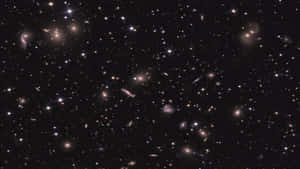 廣闊的宇宙場景，恆星和星系散落在黑暗的宇宙中。 — 太空船 壁紙