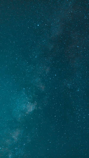 深藍綠色夜空中的銀河系，佈滿星星和星雲 — 茶園 壁紙