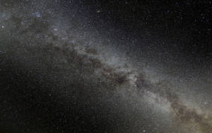 銀河系在黑暗夜空中閃爍著星光。 — 星星 壁紙